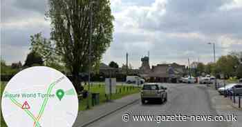 Crash in village near Colchester causing traffic to queue in the area