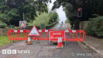 Drivers warned to stop moving signs on flooded roads