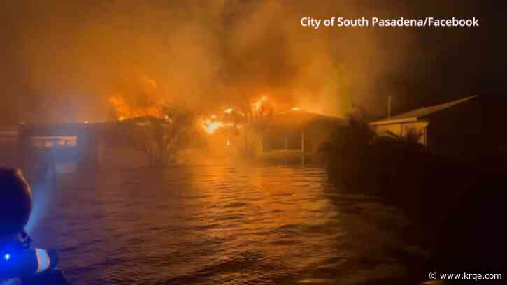 Watch: Florida home goes up in flames in dangerous flooding