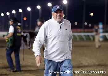 Champion horse trainer settles drug-test dispute with Downs