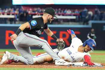 Marlins strike early, crush Blue Jays 15-5