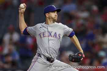 Jacob deGrom pitches 4 solid innings and the Texas Rangers hit 4 homers in a 5-2 win over the Angels