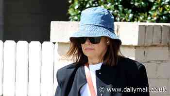 Lisa Wilkinson cuts a low key figure as she steps out in Mosman wearing a bucket hat and sunglasses amid claims she's making a comeback