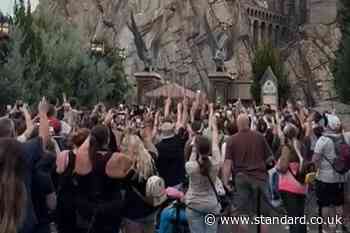 Harry Potter fans raise wands outside Hogwarts in tribute to Dame Maggie Smith