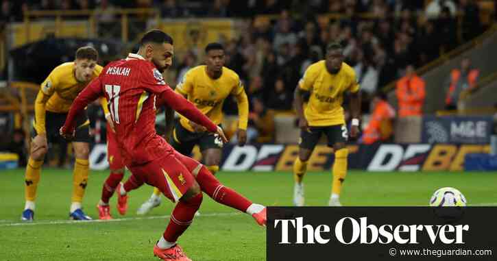 Mohamed Salah’s penalty sees off battling Wolves to send Liverpool top