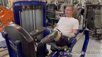 'Bionic MP' Craig Mackinlay who lost his limbs to sepsis in quadruple amputation hits the gym in video marking one year since his life-changing operation