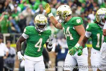 No. 16 Notre Dame holds off No. 15 Louisville comeback for 31-24 victory