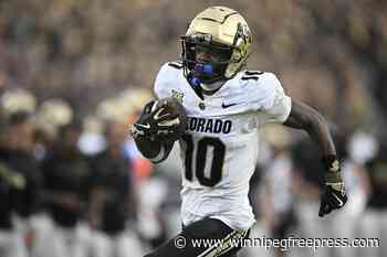 Shedeur Sanders throws for 290 yards, 3 TDs to lead improved Colorado to 48-21 rout of UCF