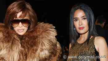 Cardi B sports a short wig and eye-catching fur camel maxi coat as she is joined by dazzling Salma Hayek at McQueen catwalk show amid PFW