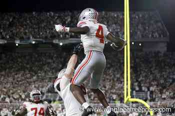 Jeremiah Smith scores 2 TDs in 1st half and helps No. 3 Ohio St pull away and rout Michigan St 38-7