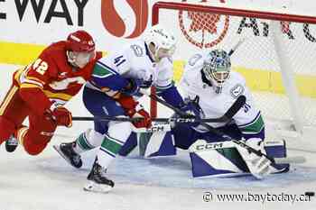 Flames remain hot in pre-season, beat Canucks 4-2