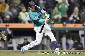 Raley rallies Mariners twice, Raleigh homers in 7-6 win over A’s in 10 innings