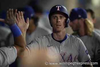 Rangers score four runs in ninth to beat Angels 9-8