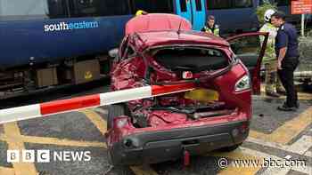 Crash between train and car blocks railway line