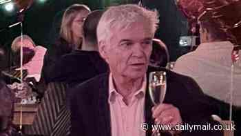 Phillip Schofield is surrounded by heart balloons and sips on fizz as he celebrates a pal's engagement  - after taking aim at those who 'betrayed him' amid TV comeback