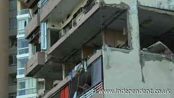 Eleven-storey Beirut apartment block balances precariously after Israeli airstrike