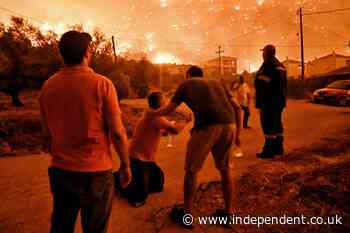 Two killed in Greece as wildfire rages near seaside town