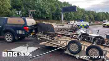 Watch moment trailer carrying fridges crashes on M5