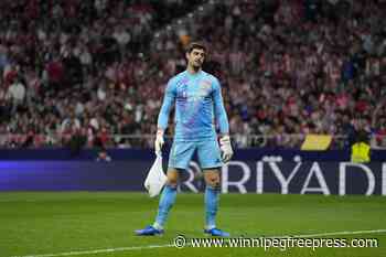 Injured Real Madrid goalie Courtois to miss Champions League game