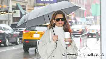 Katie Holmes heads to her Broadway show in chic trench coat - after daughter Suri Cruise 'attended showing of her play'