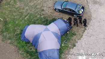 Dramatic moment armed police raid tent filled with drugs in £30,000 bust