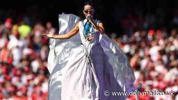 Katy Perry is stunned by a bizarre sign at the MCG as she prepares for her AFL Grand Final performance