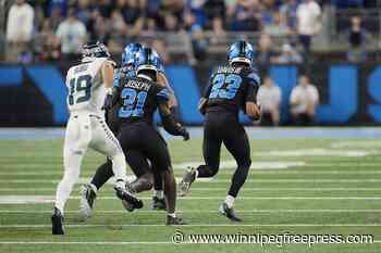 Jared Goff makes 1st NFL TD reception and throws for 2 TDs in Lions’ 42-29 win over Seahawks