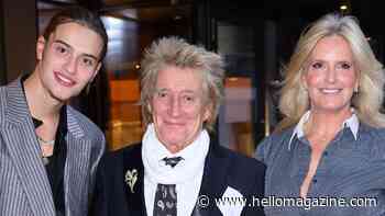 Rod Stewart and Penny Lancaster pose with model son Alastair, 18 - and he's so tall