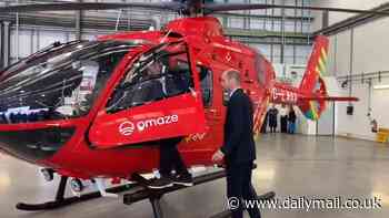 Prince of Wales is joined by David Beckham in the cockpit of a helicopter as he visits the Air Ambulance Charity