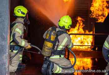 Firefighters tackle warehouse blaze as smoke billows across M2