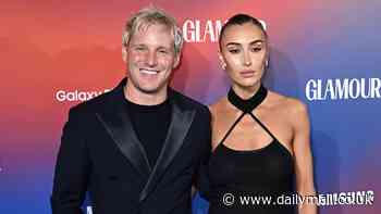 Sophie Habboo looks chic in a black halterneck dress as she joins husband Jamie Laing at the annual GLAMOUR Women of the Year Awards