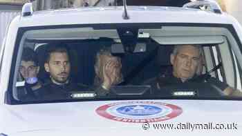 Monster of Avignon Dominique Pelicot covers his face on the way to court as he is pictured for the first time since his arrest over mass rape of his drugged wife