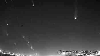 Incredible timelapse video shows Israel's Iron Dome taking out Iranian rockets with explosions lighting up night sky during aerial battle