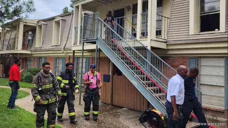 One adult, three children displaced in apartment fire; officials looking for the cause