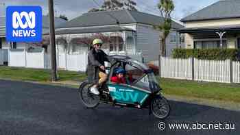 Families switch cars for cargo bikes for daily commute as cost of living continues to bite