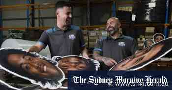 Meet the men who make the larger-than-life cut-out footy heads