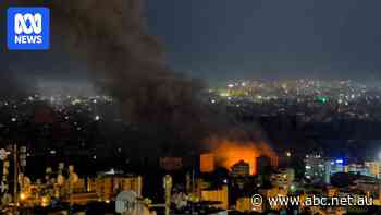 Israeli air strikes rock southern suburbs of Beirut and cut off a key crossing into Syria