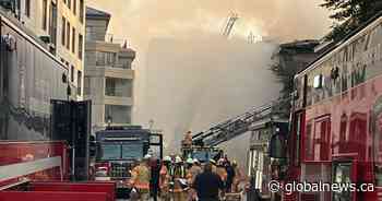 5-alarm fire in Montreal’s old port sends 1 to hospital with severe burns