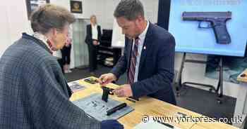 Princess Anne takes part in firearms demo while visiting Dales defence equipment firm