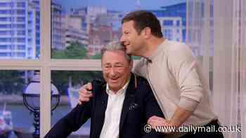 Dermot O'Leary comforts Alan Titchmarsh as they are confronted by the  the 'world's most flexible girl' on This Morning