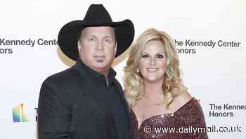 Garth Brooks pictured hand-in-hand with wife Trisha Yearwood days before sexual battery lawsuit