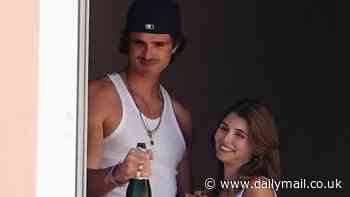 Jacob Elordi takes a swig directly from champagne bottle as he continues romantic getaway with Olivia Jade in Venice