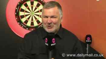 Match of the Day legend makes surprise live TV return as the former BBC host presents coverage of veteran darts event featuring sporting icons