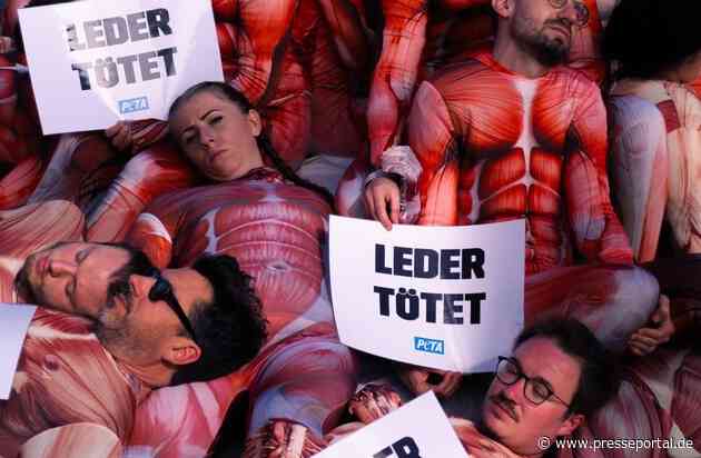 Aktuelles Bildmaterial von PETA-Großdemonstration in Köln: Mit Berg aus "gehäuteten" Menschen protestierten Tierschützer gegen millionenfaches Töten von Tieren für Lederprodukte