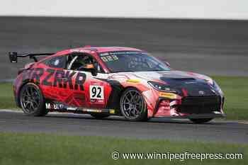 Keanu Reeves spins out at Indianapolis Motor Speedway in pro auto racing debut