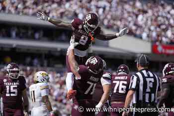 Moss scores 3 TDs as No. 25 Texas A&M gives No. 9 Missouri its first loss in 41-10 rout