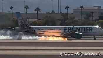 Terrifying moment flaming Frontier aircraft lands at major airport