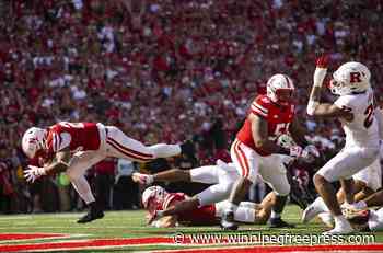 Cornhuskers beat the heat and then Rutgers 14-7 to move within a win of bowl eligibility