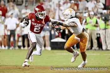 Singleton scores late TD as Arkansas beats No. 4 Tennessee 19-14