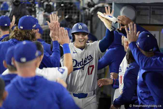 Ohtani homers in playoff debut, Dodgers rally to beat Padres 7-5